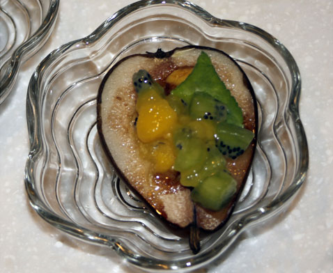 Serve warm stuffed pears with refrigerator cold fruit on top.